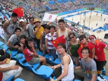 The CUHK delegation watches the beach volleyball game