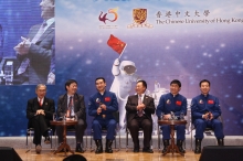 The three astronauts and the scientists answer questions from students