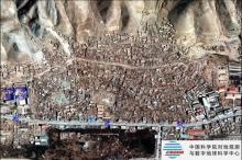 Seriously damaged area – after earthquake (aerial photo with 0.4 m). Over 80% of the buildings were damaged.