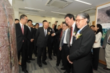 Officiating guests learn about the research projects conducted by researchers based at the Fok Ying Tung Remote Sensing Science Building