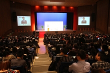 About 1,400 students attending the lecture