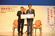 Prof. Andrew Chan Chi-fai, Head of Shaw College, CUHK (left) presents a souvenir to Dr the Honourable Leung Chun-ying