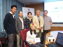 Prof. William Wang Shi-yuan (second from right, back row) and his research team, including Dr. James Minett, Research Associate, Department of Electronic Engineering, CUHK (first from right, back row)