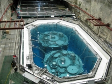 The first pair of antineutrino detectors submerged in pure water in the Daya Bay Experimental Hall #1, each being 5m tall and 5m in diameter.  The Hong Kong team designed and built a subsystem in each of the detectors.