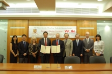 The signing ceremony is witnessed by CUHK Pro-Vice-Chancellor Prof. Jack Cheng (fourth from the right) and champions identified for the WUN Global Challenges including Prof. Sian Griffiths, Director and Professor of the School and Public Health and Primary Care (third from the left); Prof. Wong Wing Shing, Professor of Information Engineering (third from the right); and Prof. Simon Haines, Chairman and Professor of the Department of English (second from the right).