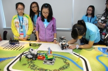 The young girls demonstrated creativity and problem-solving skills by building and intelligently programming a Lego Robot to perform the required tasks in the Green Cities Challenge.