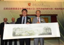 Mr Timothy P.T. Wu receives a souvenir from Prof Joseph Sung.