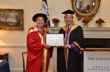 Prof. Joseph J.Y. Sung, Vice-Chancellor and President of CUHK (right) presents the certificate of Honorary Degree of Doctor of Laws to Prof. Richard Charles Levin, President of Yale University. (Photos courtesy of Yale University/Michael Marsland)