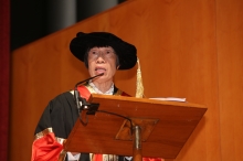 Dr. Lee delivers an address