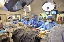 A team of surgeons, cardiologists, anaesthetists and interventional radiologists working seamlessly in the Hybrid Cardiovascular Operating Theatre