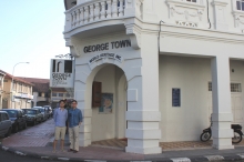 XU Kuo, Richard (left) posed at the gate of the George Town World Heritage Incorporated office.