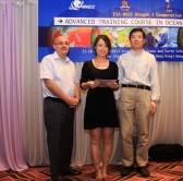 ESA representative Dr. Andy ZMUDA (left) and ISEIS deputy director Prof. HUANG Bo (right) present best poster award to one of the winners.