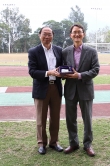 Prof. Henry Wong, Dean of Science and Chairman of CU Staff Football Association (left) presents a souvenir to Mr. Cho Yong-Chun, Consulate General of the Republic of Korea in Hong Kong.