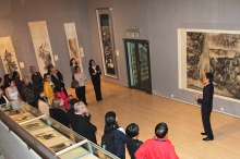 The guests join the tour led by Prof. Josh Yiu, Associate Director of the Art Museum (right).