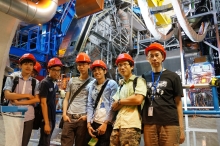 Part of the CUHK team in front of the ATLAS detector. From right to left: Prof. Chu Ming-chung, Research Assistant Chan Yat Long, MPhil student Tsui Ka Ming, undergraduate students Chow Yun Sang, Tam Pok Ho, Dung On Yu, and PhD student Lu Haonan.