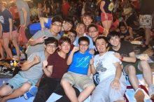 Prof. Joseph Sung and 1,500 CUHK teachers, students, alumni and friends gather at the University Mall to watch the World Cup Final.