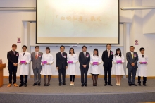 Mr. Ken Sin Chun Ho , President of the Chinese Medicine Alumni Association at CUHK (1st left); Dr. Ho Wing Tim , Chairman of the Board of Directors of Pok Oi Hospital (3rd left); Dr. Lam Man Kin, Assistant Director of the Department of Health (Traditional Chinese Medicine) (5th left); Dr. Ko Wing Man, Secretary for Food and Health (6th right); Prof. Francis Chan Ka Leung, Dean of Faculty of Medicine at CUHK (4th right); and Prof. Albert Leung Wing Nang, Director of the School of Chinese Medicine at CUHK (2nd right) assist the Chinese medicine freshmen in putting on their white coats and present each of them a wrist-cushion, which symbolizes the professionalism in Chinese Medicine.