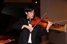 Luk Wai Chun, a music student at CUHK, composes a theme song for the exhibition.
