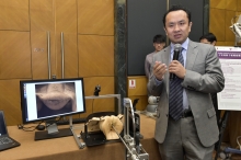 Prof. Yunhui Liu, Professor, Department of Mechanical and Automation Engineering, CUHK demonstrates the robot assistant for hysterectomy introduced in 2014.