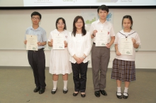 Ms Imelda CHAN, Executive Manager, Charities of HKJC (middle), presents certificates to the ‘GAIA Partners of the Year’.