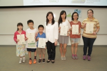 Ms Imelda CHAN, Executive Manager, Charities of HKJC (middle), presents certificates to the ‘GAIA Stars of the Year’.