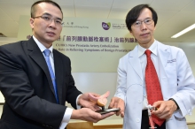 Professor Yu (right) and Professor Ng showcase the microspheres and catheter using in PAE.