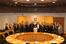 The attending guests and lecturers pose for a group photo at the opening ceremony.