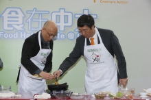 Mr. K.S. Wong and Prof. Joseph Sung perform a cooking demonstration with food trimmings.