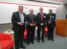 Professor Christopher Gane, Dean of the Faculty of Law, CUHK (2nd right) presents souvenirs to Justice Kemal Bokhary, (1st right), Justice Antonin Scalia (2nd left) and Professor Bryan Garner.