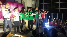 Prof. Joseph Sung sings a song during an evening event in the orientation camp of Lee Woo Sing College.