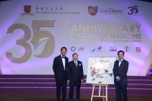 (Centre) Mr. Charlie LEE, Chairman of The Charlie Lee Charitable Foundation bided a traditional Chinese flowers-and-birds painting at HKD 360,000.  The painting was drawn by Prof. Philip CHIU (right), Professor of the Department of Surgery and Assistant Dean (External Affairs) of the Faculty, with calligraphy from the hand of Vice-Chancellor Prof. Joseph SUNG. The money will be used to enrich the Gerald Choa Memorial Fund for medical education of the Faculty.