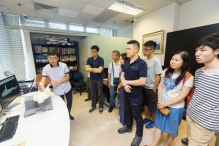 Researchers demonstrating the engineering technology in a laboratory.