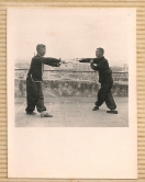 A demonstration of sword-fighting by Master Wong Hon Fan and his student.