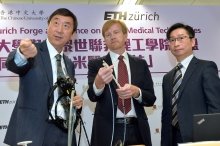 Prof. Joseph SUNG (Left) introduces the operation of the new magnetic guided endoscope.