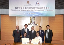 Prof. Poon Wai-yin (left, front row), Pro-Vice-Chancellor, CUHK, and Dr Trisha Leahy (right, front row), Chief Executive, HKSI, sign the MOU, with the signatures witnessed by The Hon Lau Kong-wah (middle, back row), Secretary for Home Affairs,  Mr Yeung Tak-keung (1st right, back row), Commissioner for Sports, Prof. Joseph Sung (2nd left, back row), Vice-Chancellor and President, CUHK, Prof. Michael Hui (1st left, back row), Pro-Vice-Chancellor, CUHK, and Mr Carlson Tong (2nd right, back row), Chairman, HKSI and UGC.