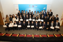 Students from the CUHK Business School are presented with their certificates for completing the three-month program