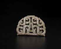 Jade hui-dragon pendant in openwork
Warring States Period
L: 4.5 W: 2.9 Th: 0.3 cm
Recovered from tomb no.2 at Jiuliandun, Zaoyang, Hubei province in 2002
Hubei Provincial Museum

Formed by four hui-dragon facing towards the oval centre or facing away from the centre in S-shaped to form a bilaterally symmetrical pattern.