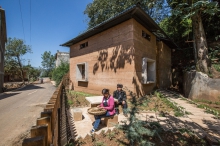 The CUHK team builds a prototype house for an aged couple with innovative rammed-earth building system.