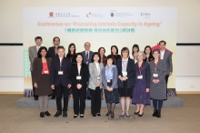 The attending guests pose for a group photo at the conference.