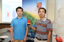 Prof. Zhang Kehuan (right) and his PhD student TANG Di (left) have developed “Face Flashing” protocol. They are now discussing with a local company to put the protocol into practical use.