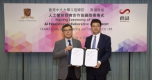 Professor Martin D. F. Wong, Dean of Engineering, CUHK (left) and Mr. Hailong Shang, Managing Director of SenseTime Hong Kong (right), take a photo together after signing the collaboration agreement.