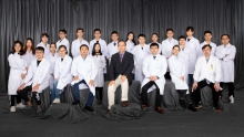 Professor Ling Qin and his research team members