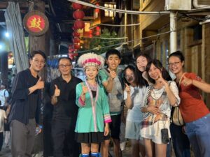 Students interact with ethnic minority villagers in Zhaoxing Dong Village