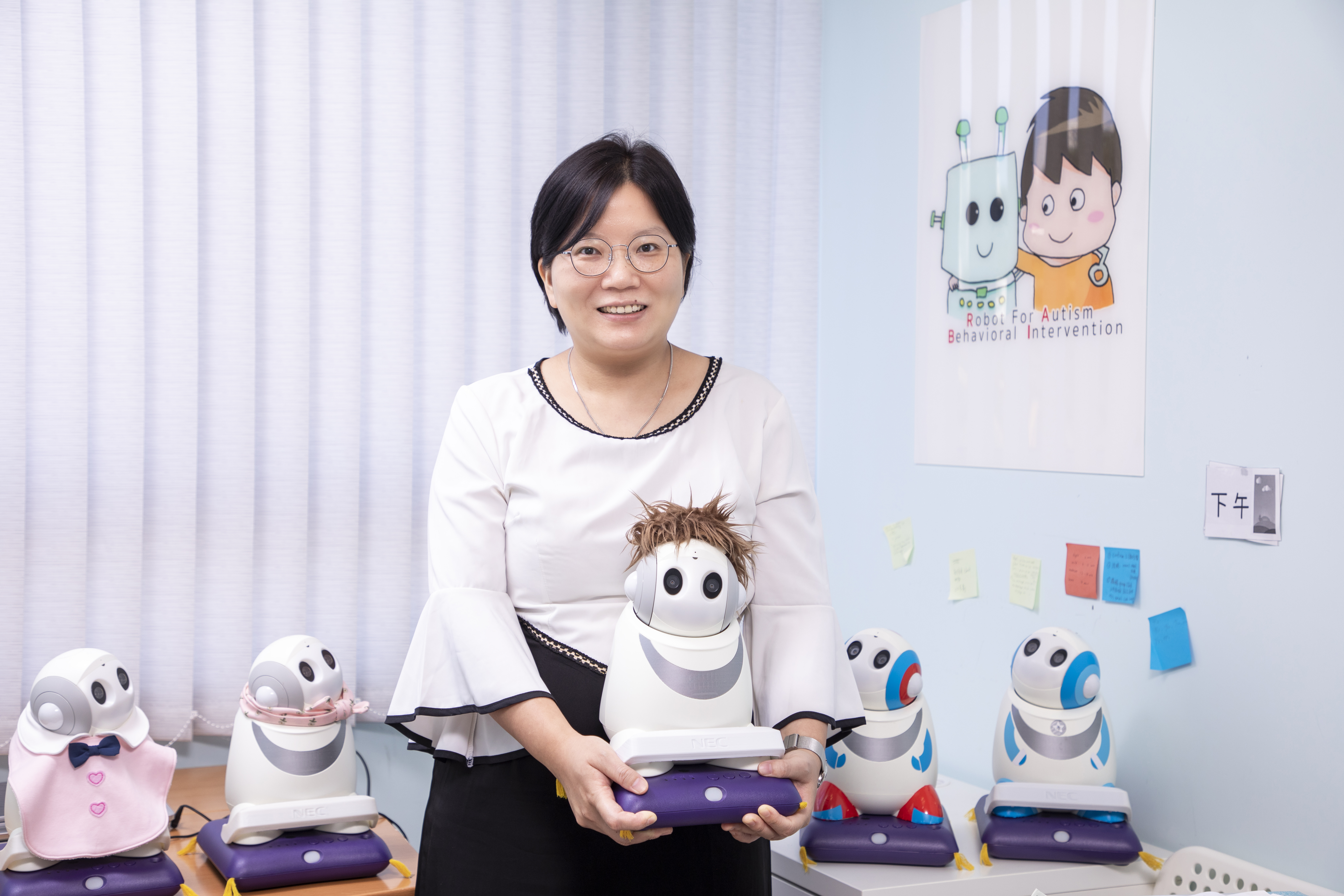 This happy robot helps kids with autism