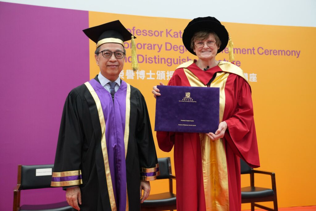 CUHK Acting Vice-Chancellor Professor Alan K.L. Chan (left) confers the degree of Doctor of Science, honoris causa, to renowned biochemist Professor Katalin Karikó.