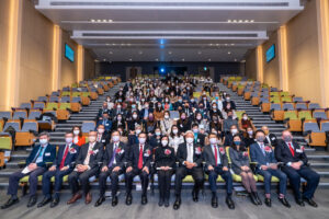 Guests at the ceremony taking a group photo.