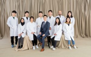Professor Billy Ng (front row, centre), Assistant Professor in the School of Pharmacy at CU Medicine, and his research team.