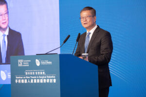 Mr. Paul Chan delivers the opening speech at the seminar.