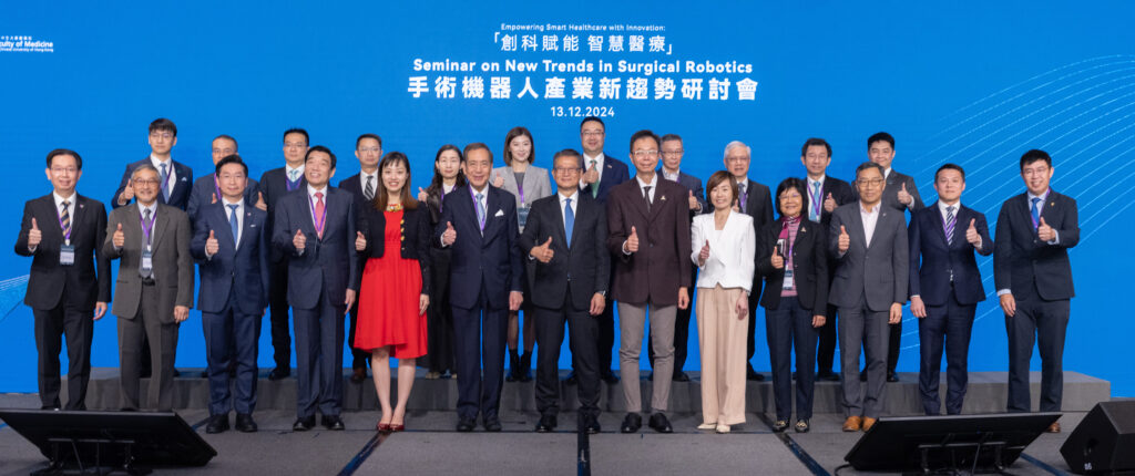 Guests attending the seminar include <br />
 (Front row, from left) Professor Simon Ng, Chairman of the Department of Surgery at CU Medicine; Professor Michael Li, Director of Minimally Invasive & Robotic Surgery Development at the Hong Kong Sanatorium & Hospital; Professor Philip Chiu, Dean of CU Medicine; Mr Henry Fan, Chairman of the Hospital Authority; Ms Lillian Cheong, Under Secretary for Innovation, Technology and Industry of the Hong Kong government; Professor Arthur Li, ExCo non-official member; Mr Paul Chan, The Financial Secretary; Professor John Chai, Chairman of CUHK Council; Ms Clara Chan, Chief Executive Officer of the Hong Kong Investment Corporation Limited; Professor Sham Mai-har, Pro-Vice-Chancellor and Vice-President (Research) of CUHK; Mr Albert Wong, Chief Executive Officer of  the Hong Kong Science and Technology Parks Corporation; Professor Samuel Au, Founder and CEO of Cornerstone Robotics; Dr Chung Kin-lai, Cluster Chief Executive of New Territories East Cluster, Hospital Authority. <br />
(Back row, from left) Dr Jerry Wang, Co-Founder, CTO & COO of Cornerstone Robotics; Professor Ng Chi-fai from the Department of Surgery at CU Medicine; Dr Frank Chan, Hospital Chief Executive of Hong Kong Buddhist Hospital; Dr Joe Fan, Director of Cluster Services of the Hospital Authority; Dr Wendy Hong, Legislative Council member; Ms Eunice Yung, Legislative Council member; Mr Shang Hailong, Legislative Council member; Dr Fung Hong, Executive Director and Chief Executive Officer of CUHK Medical Centre, Dr Lee Tsz-leung, Hospital Chief Executive of Hong Kong Children's Hospital; Professor Allen Chan, Associate Dean of CU Medicine; Dr Alexis Cheng, Co-Founder & Vice President of Operation & Business Strategy of Cornerstone Robotics.