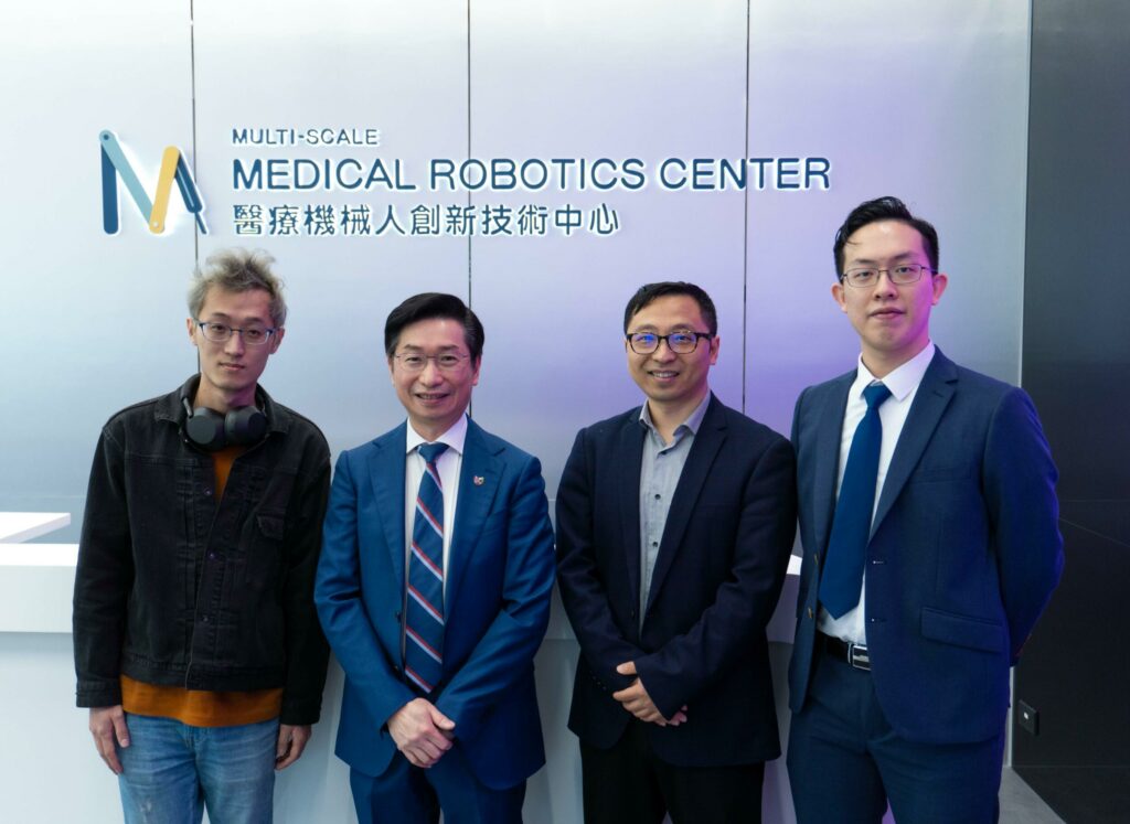 RefluxChip – A Miniature Battery-free Remote Sensing System for Real-Time Monitoring of Gastroesophageal Reflux Disease<br />
(From left) Mr Zhang Chong, Professor Philip Chiu Wai-yan, Professor Zhang Li, and Professor Chan Kai-fung